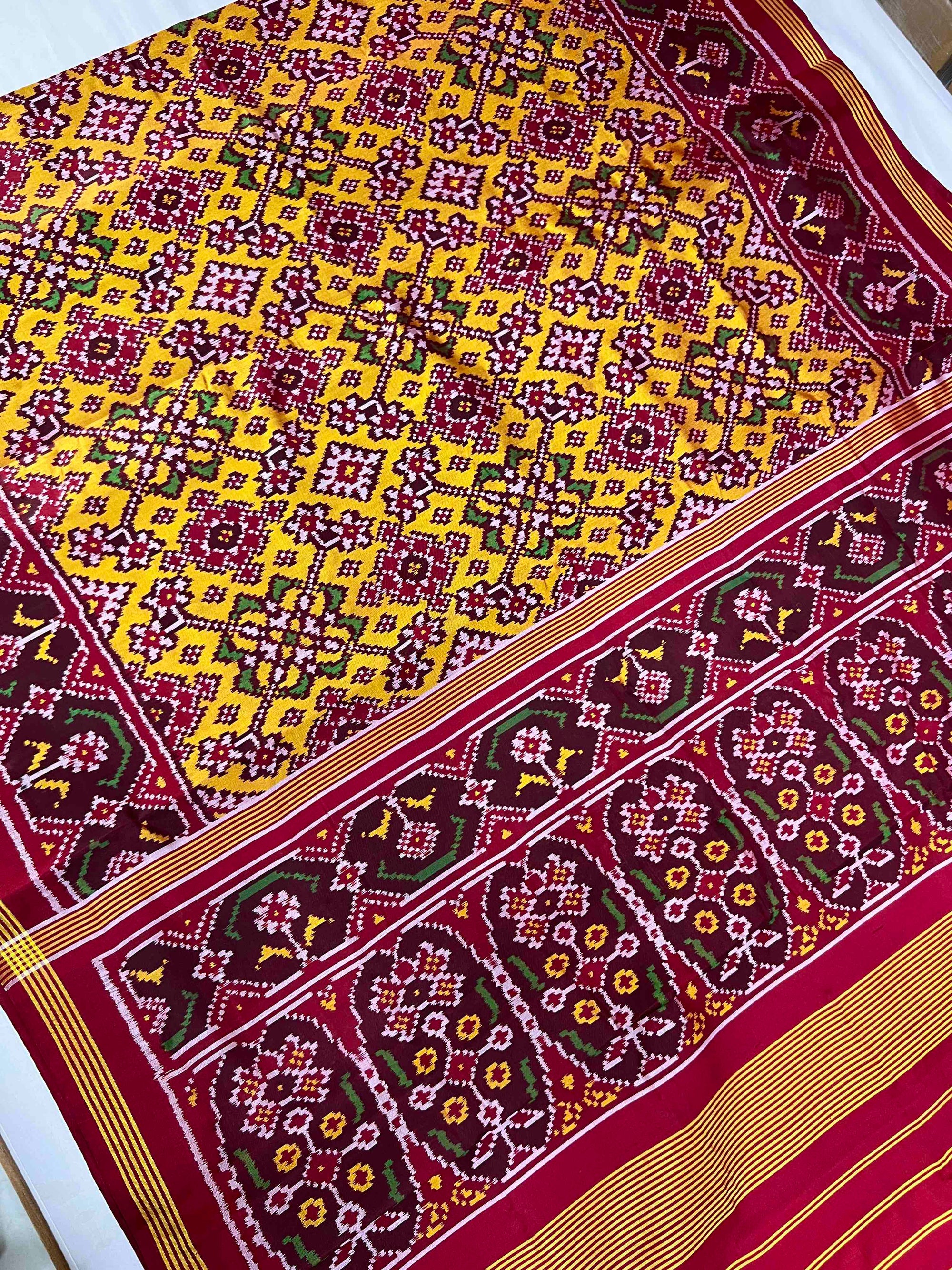 Musturd Yellow Navratan Hand Woven Rajkot Ikat Patola Silk Saree
