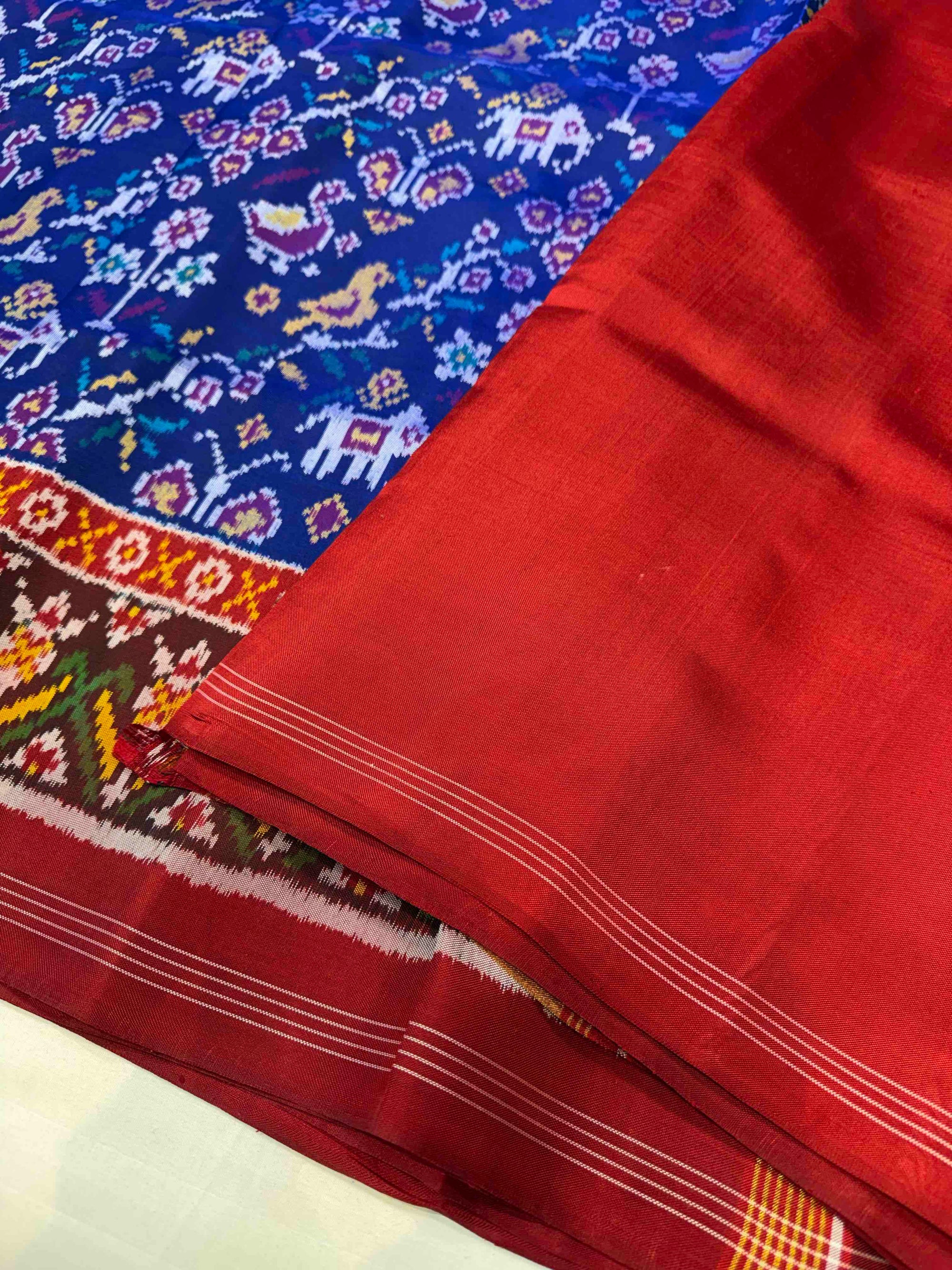 Blue And Red Fancy Small Motifs Design Hand Woven Ikat Patola Silk Saree