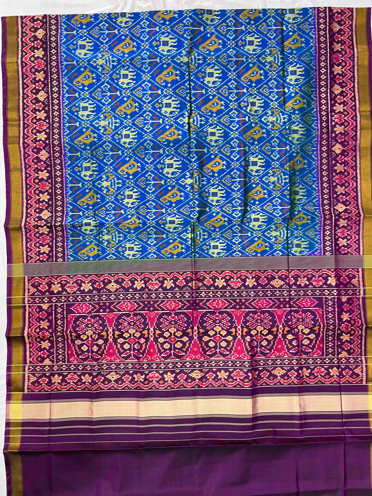 Sky Blue With Purple Narikunj Design Hand Woven Rajkot Patola Silk Saree