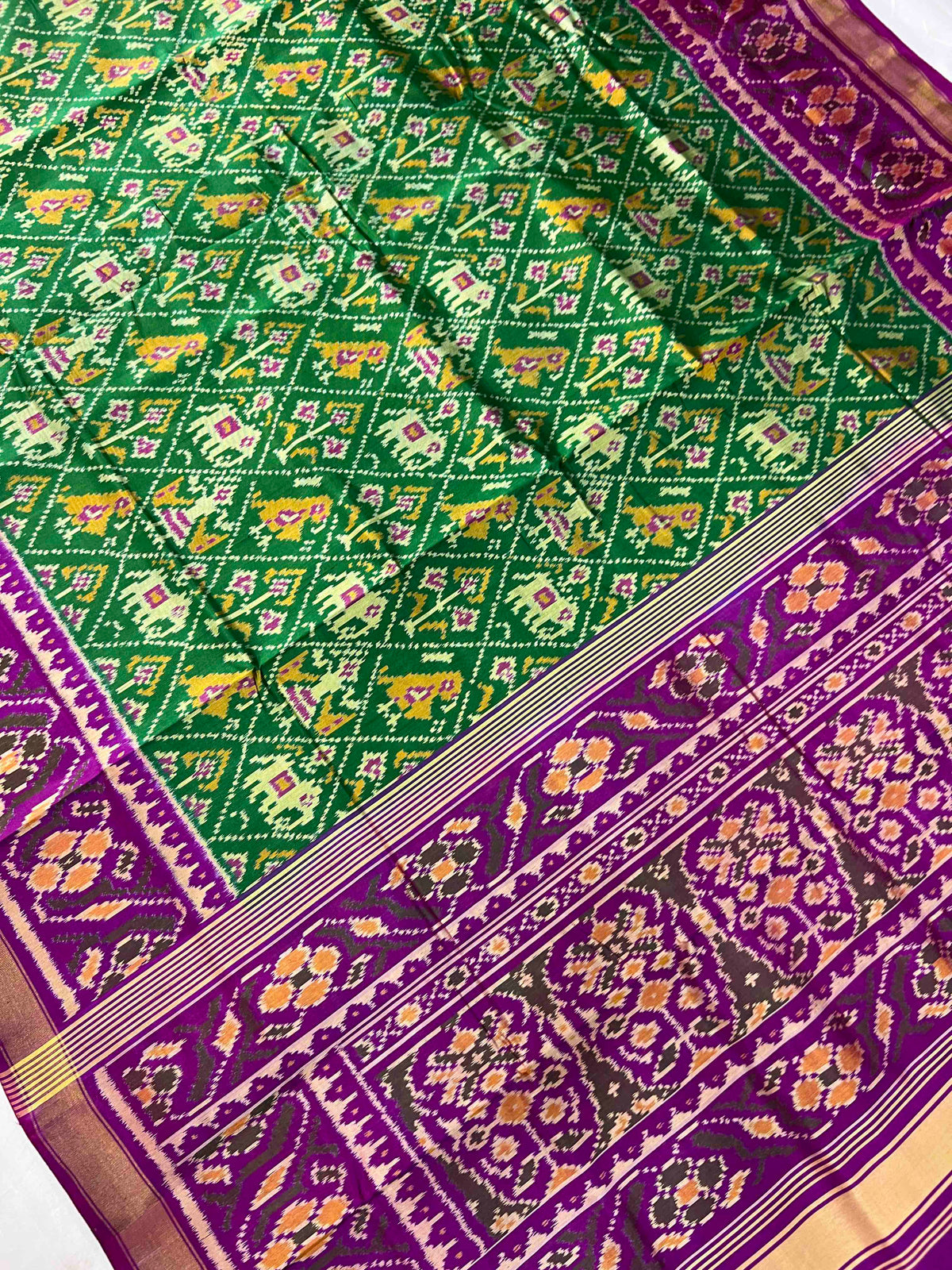 Green With Purple Narikunj Design Hand Woven Rajkot Patola Silk Saree