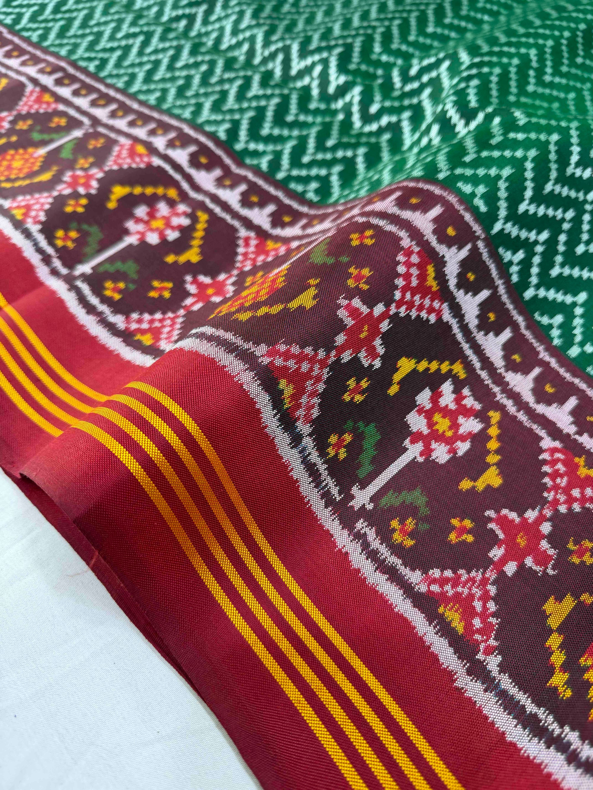 Green And Red Laheriya Design Hand Woven Rajkot Ikat Patola Silk Saree