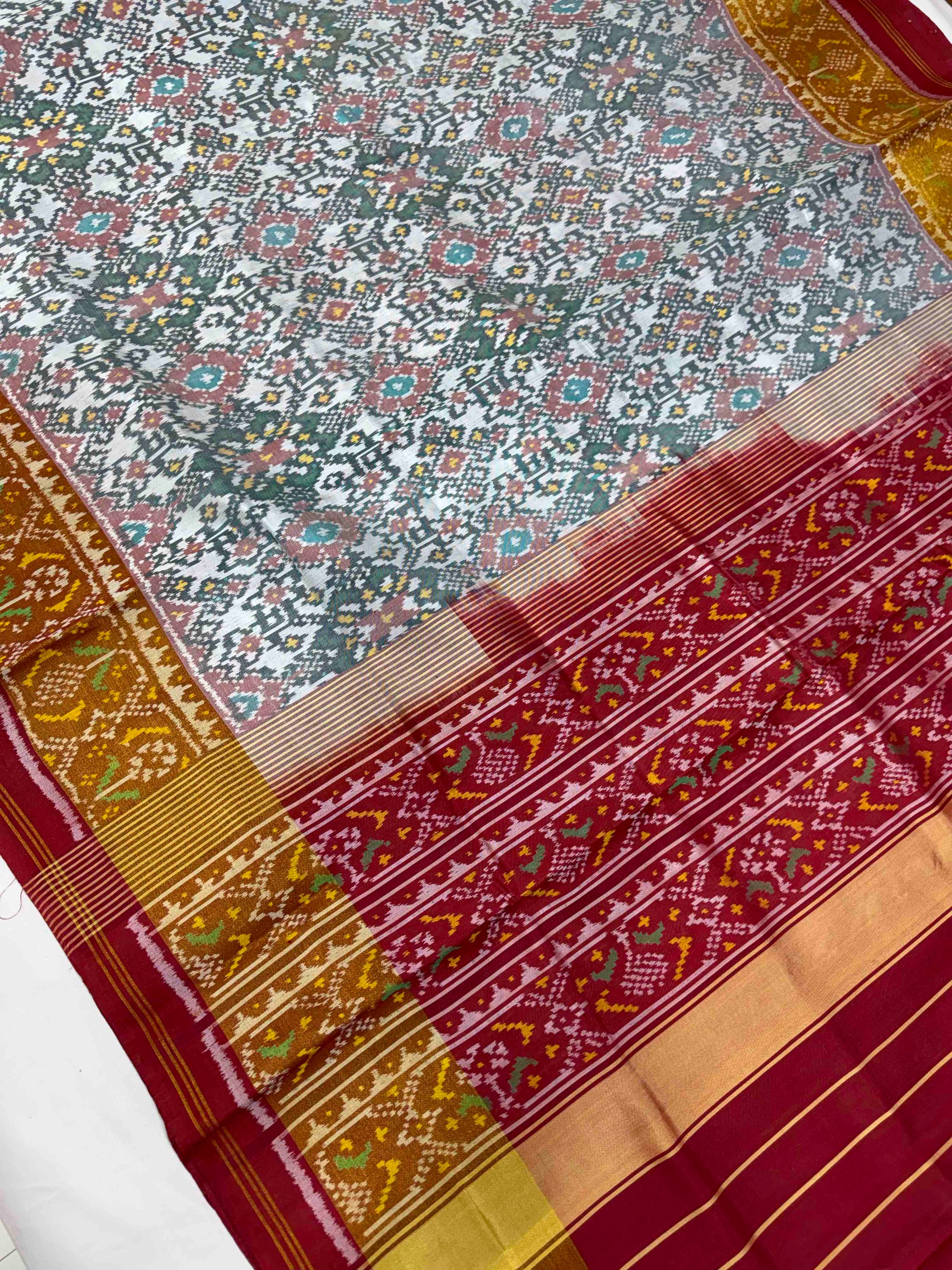 White And Red Navratan Hand Woven Rajkot Patola Silk Saree