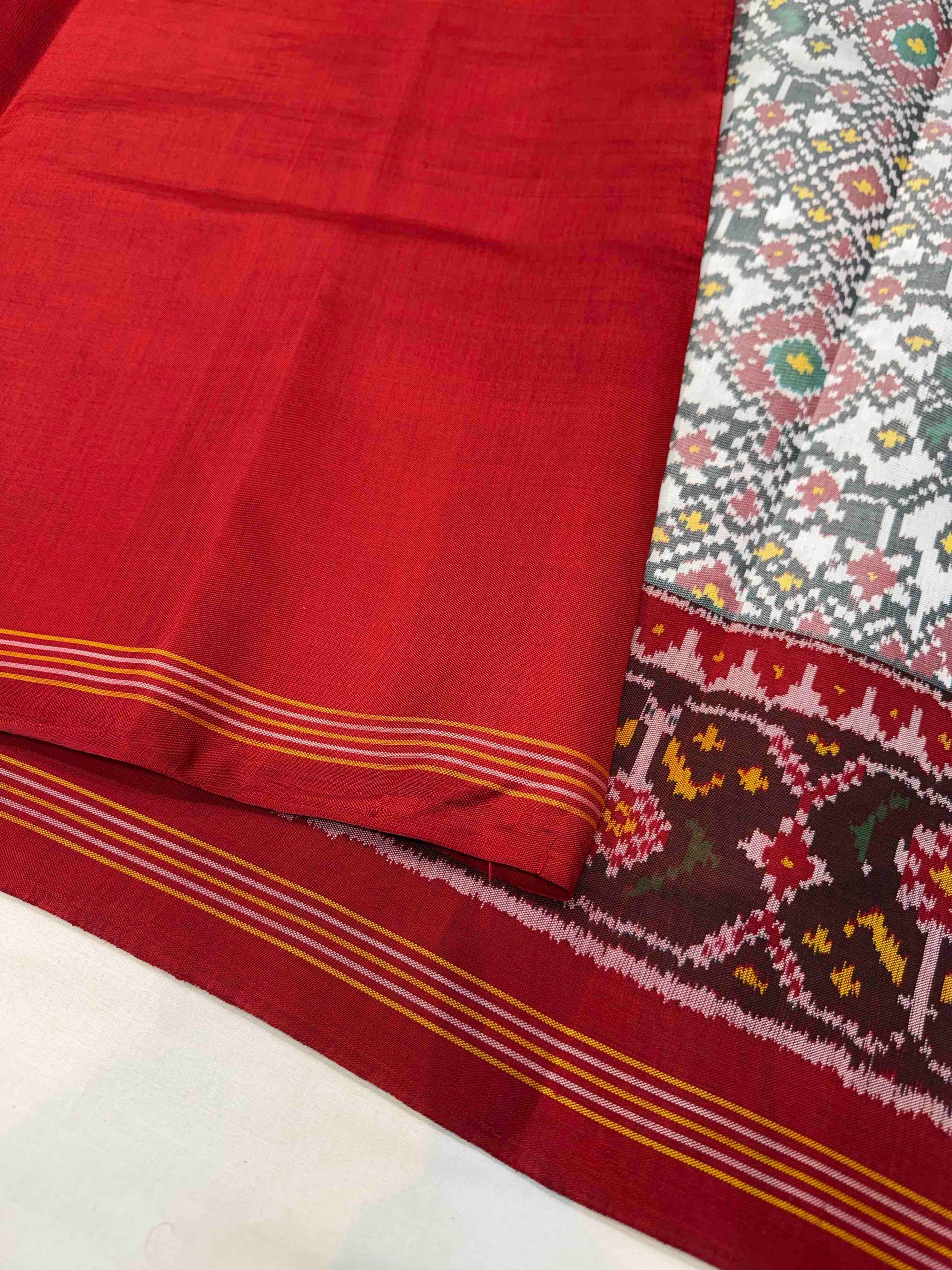 White & Red Navratan Design Hand Woven Ikat Patola Silk Saree