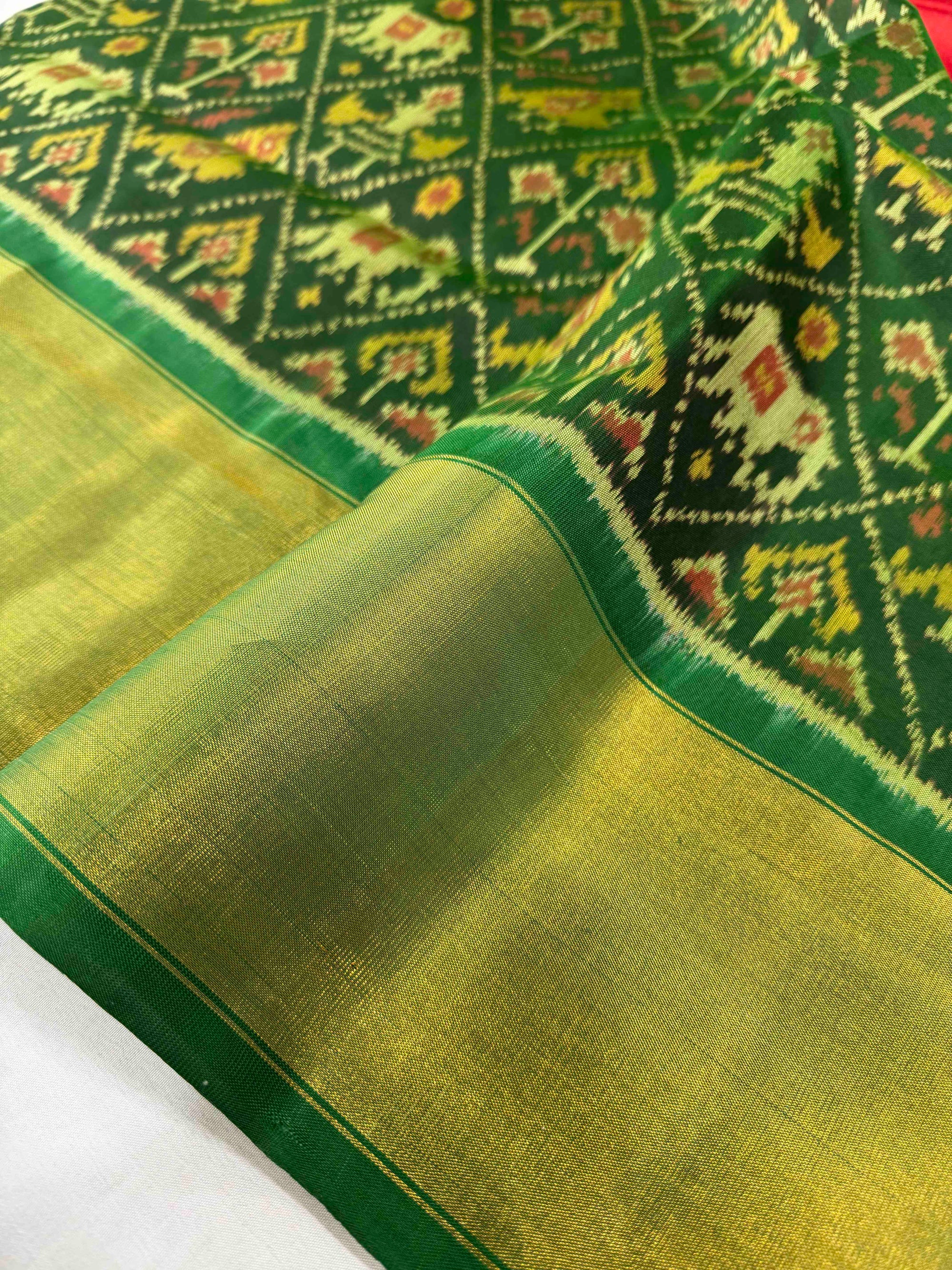 Green Narikunj Skirt With Yellow Red Body Hand Woven Rajkot Patola Silk Saree