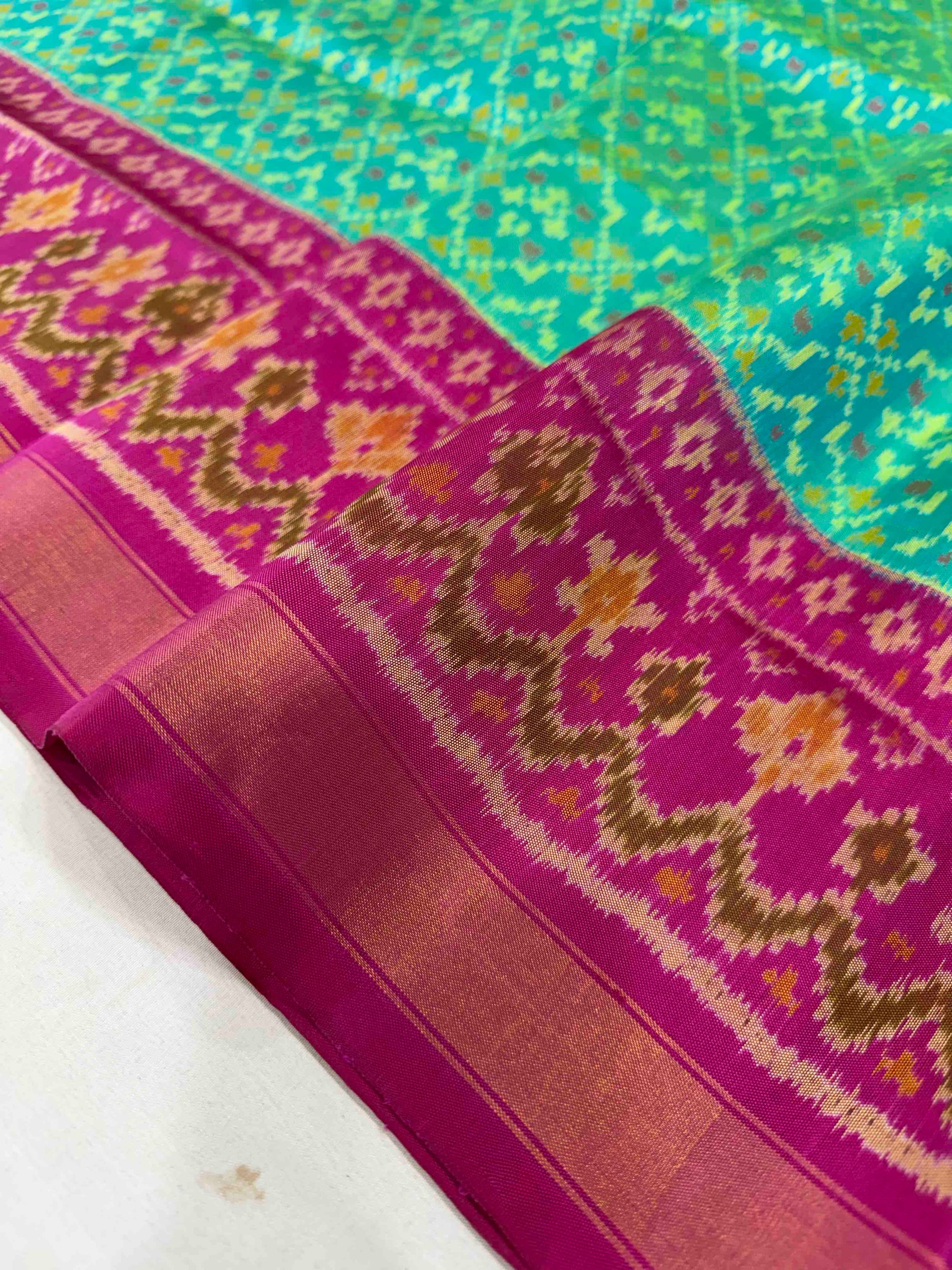 Sky Blue & Pink Buttonfull Design Hand Woven Rajkot Patola Silk Saree