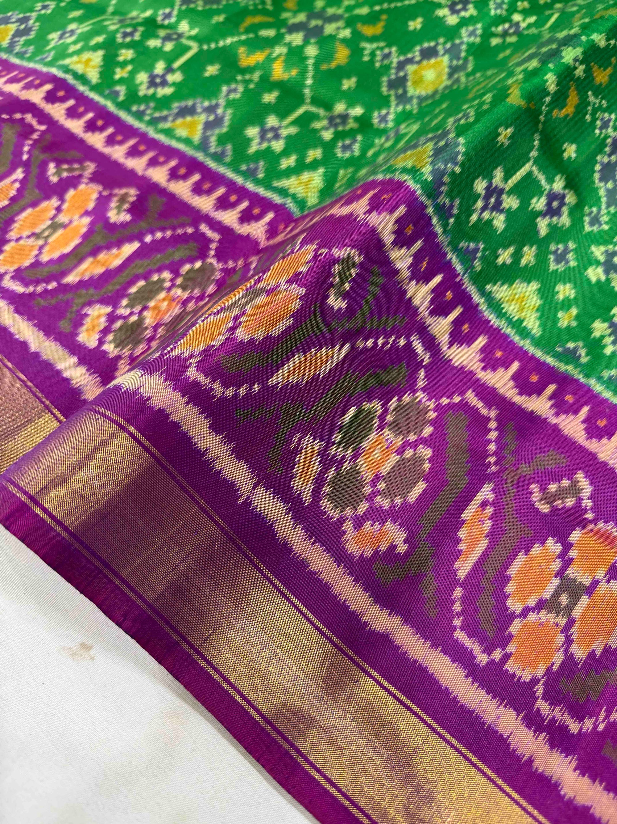 Green And Purple Navratan Hand Woven Rajkot Patola Silk Saree