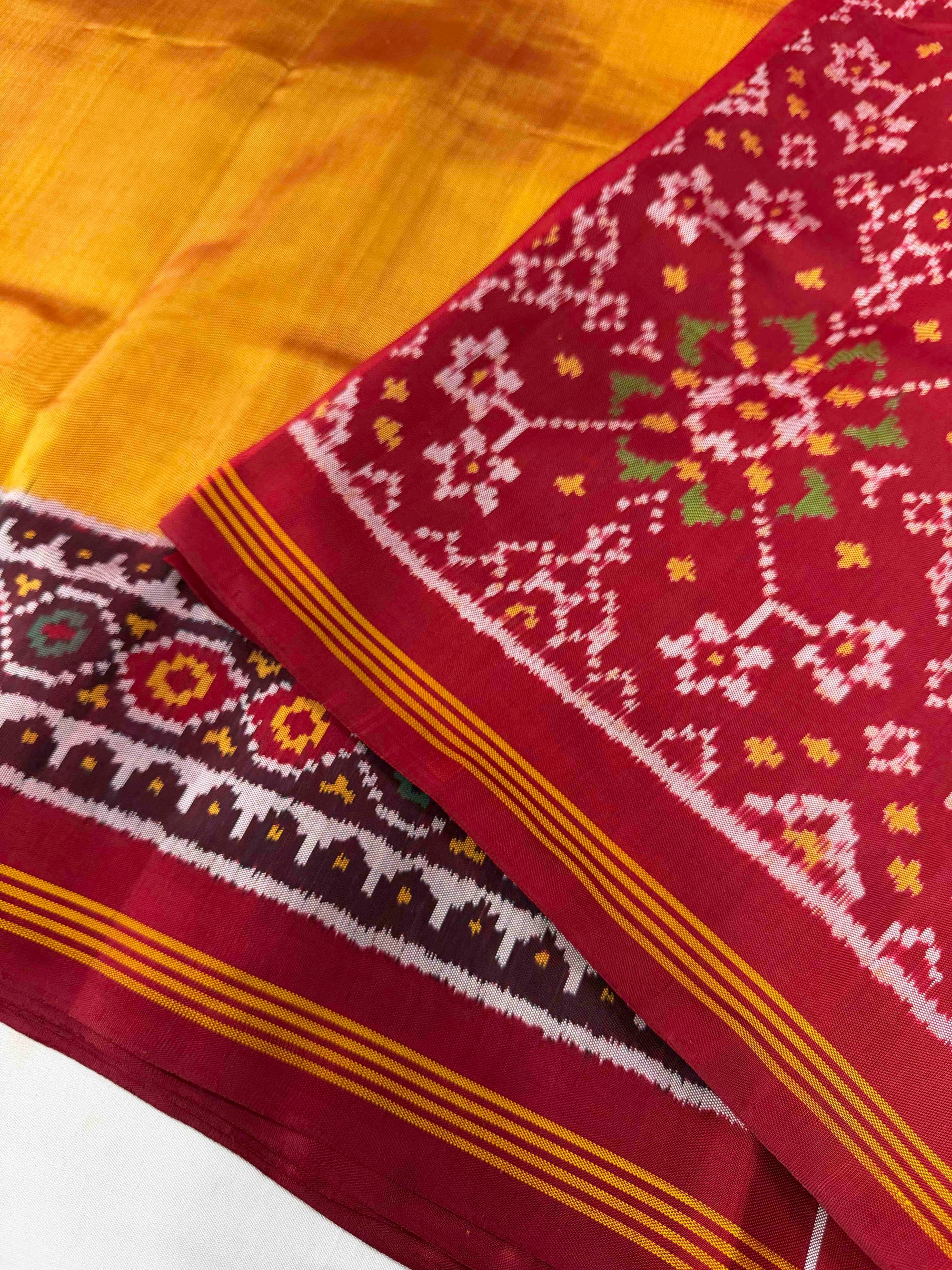 Musturd Yellow & Maroon Plain Gala Border Rajkot Ikat Patola Silk Saree