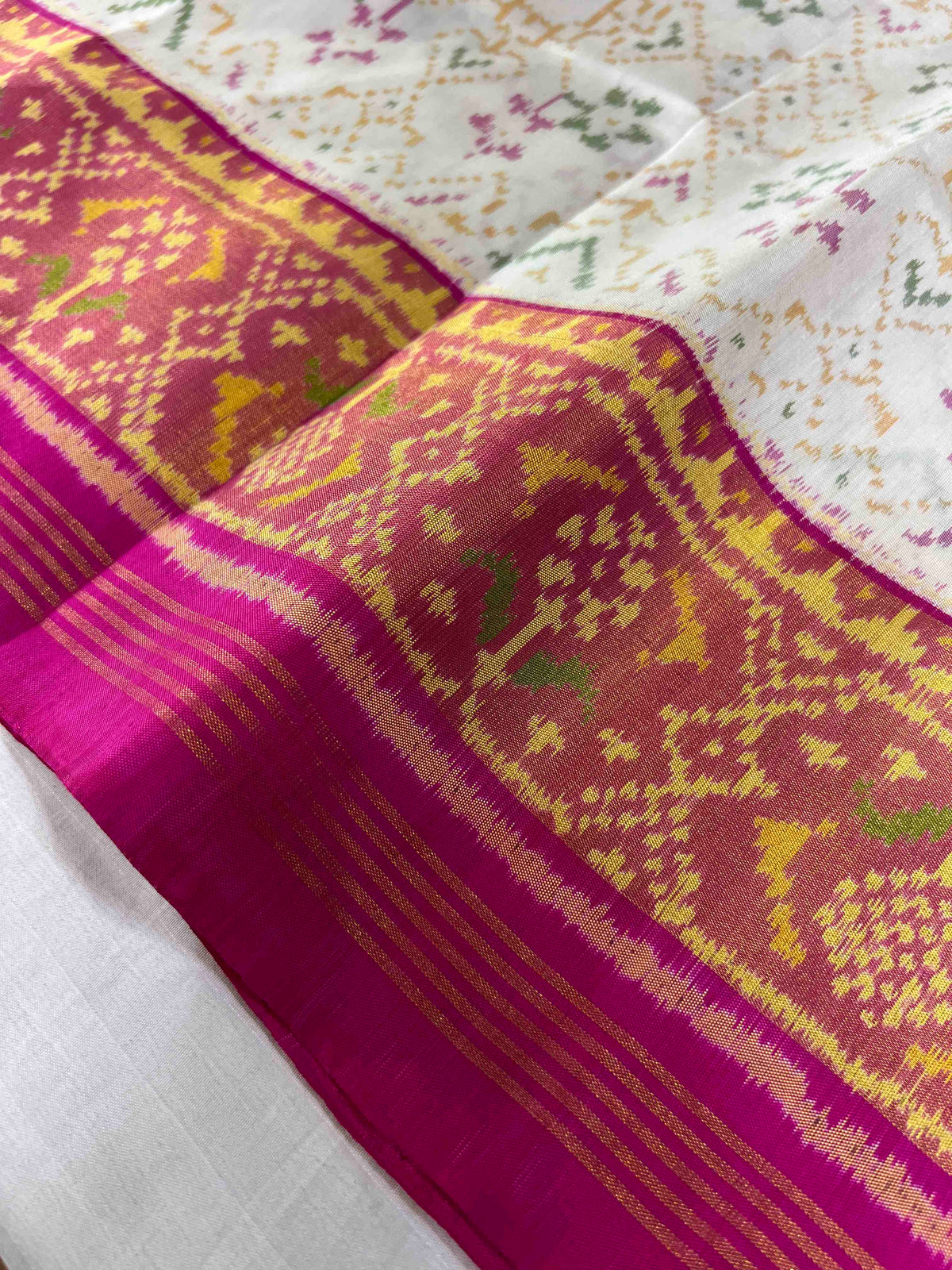 Pink And White Navratan Mix Design Hand Woven Rajkot Patola Silk Saree