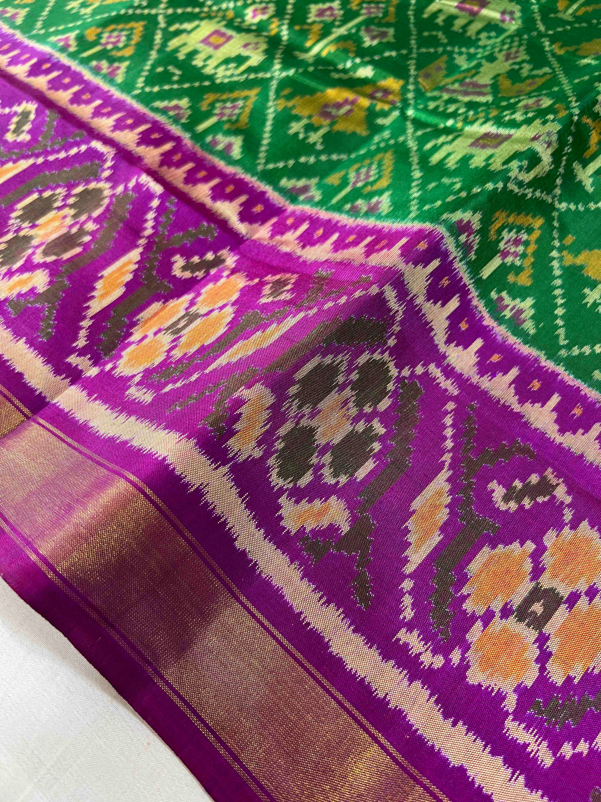 Green With Purple Narikunj Design Hand Woven Rajkot Patola Silk Saree