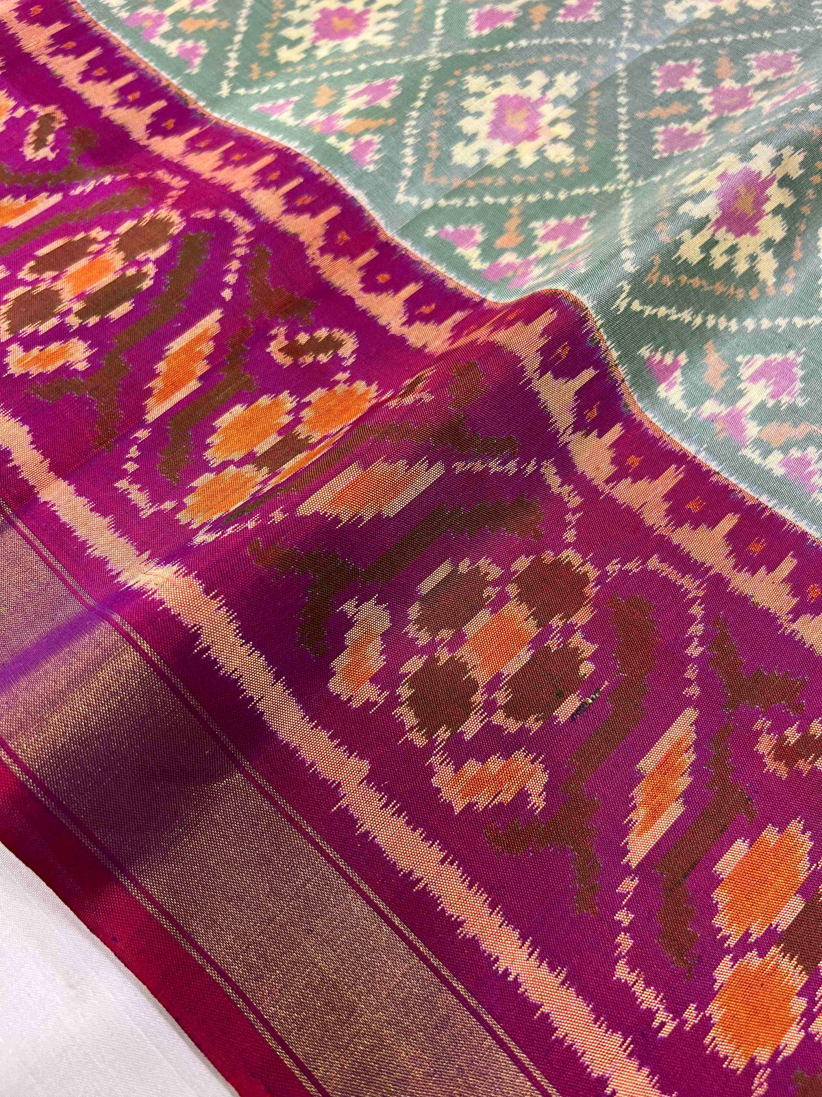 Light Green With Purple Navratan Design Hand Woven Rajkot Patola Silk Saree