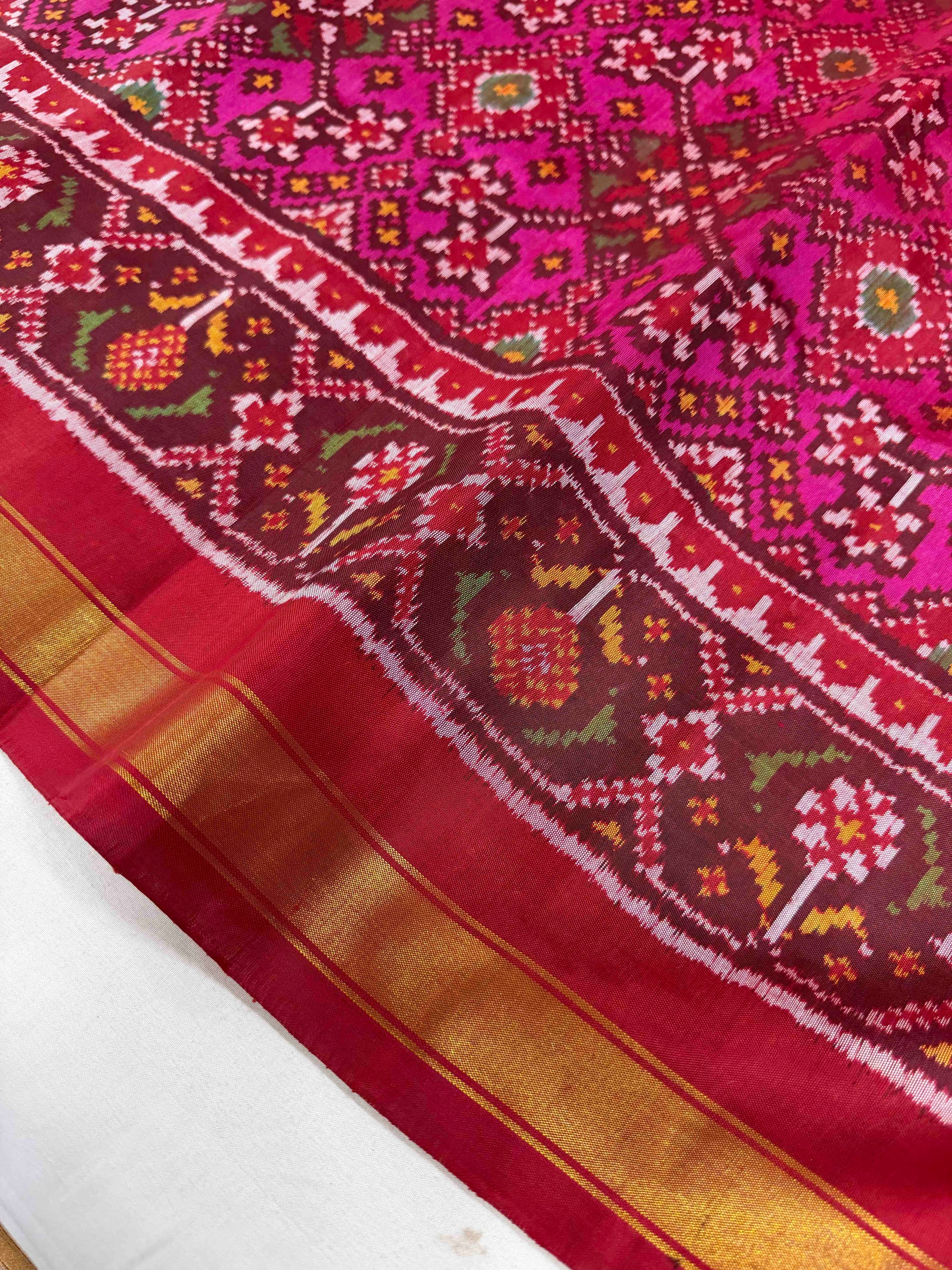 Pink With Maroon Navratan Hand Woven Rajkot Patola Silk Saree