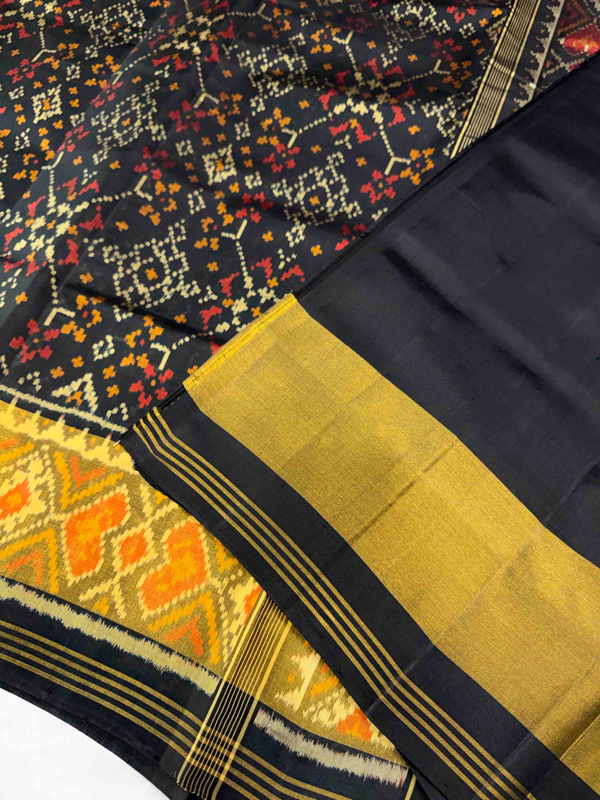 Full Black Navratan Design Hand Woven Rajkot Patola Silk Saree