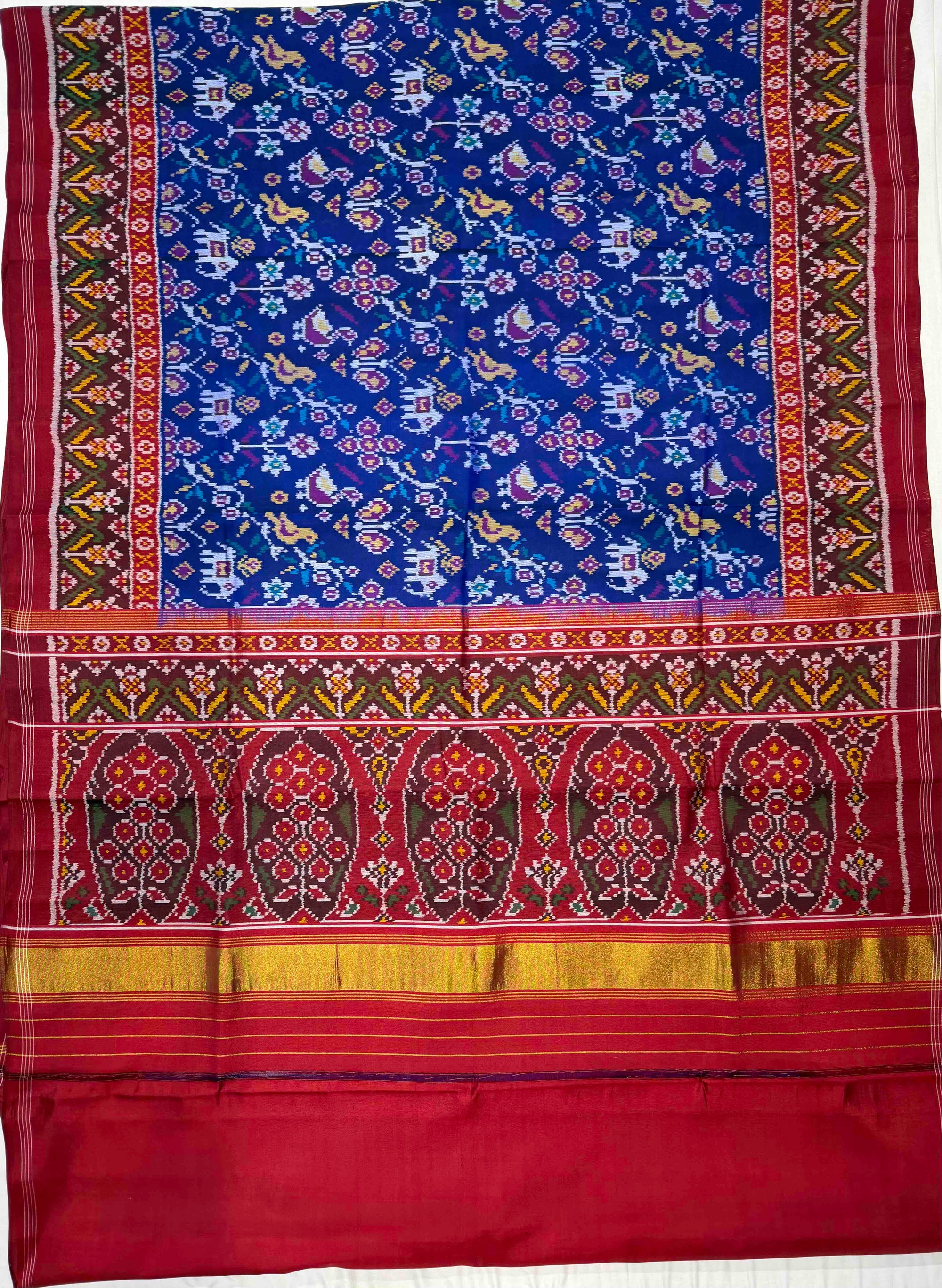 Blue And Red Fancy Small Motifs Design Hand Woven Ikat Patola Silk Saree