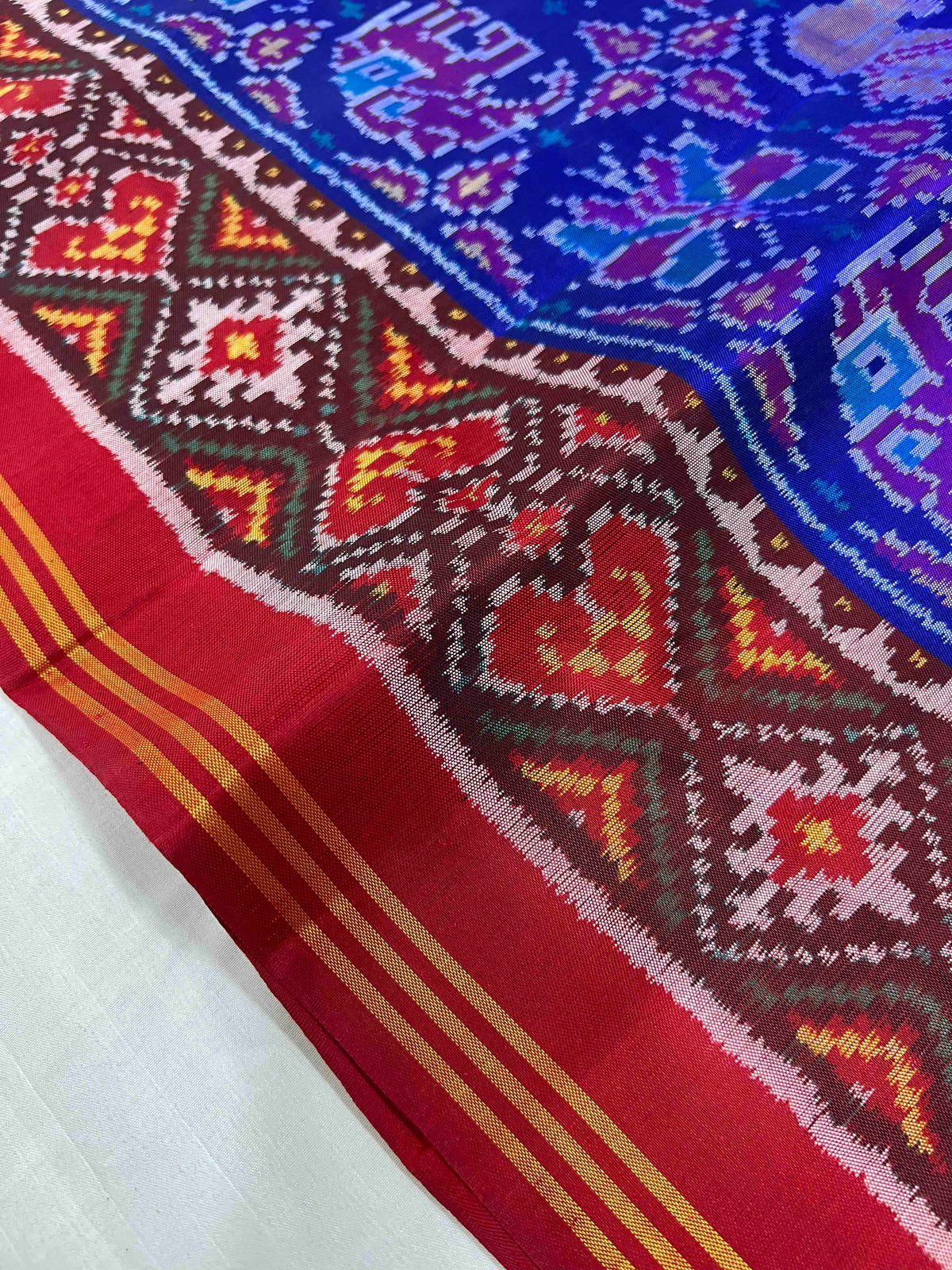 Blue And Red Small Motifs Design Hand Woven Rajkot Ikat Patola Silk Saree