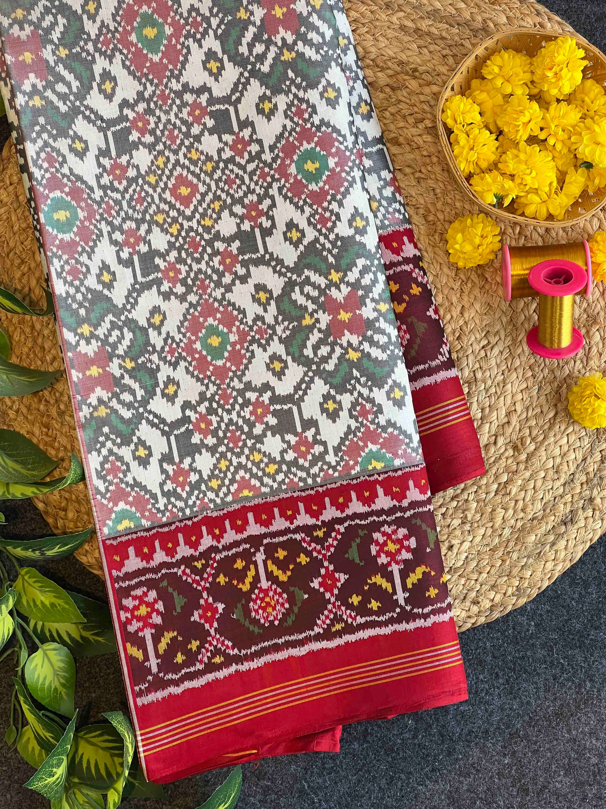 White & Red Navratan Design Hand Woven Ikat Patola Silk Saree