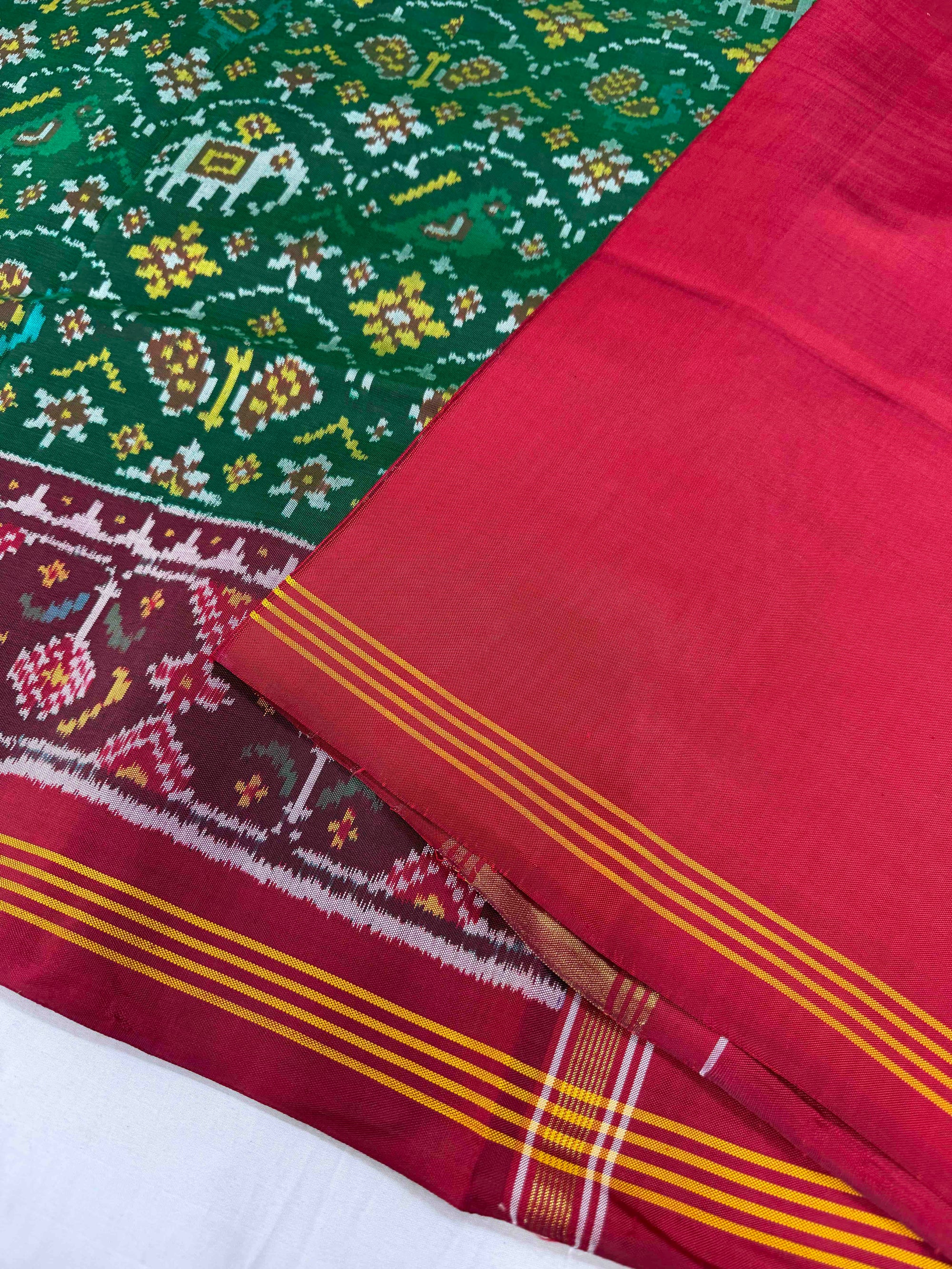 Green And Red Maroon Small Motifs Design Hand Woven Rajkot Ikat Patola Silk Saree