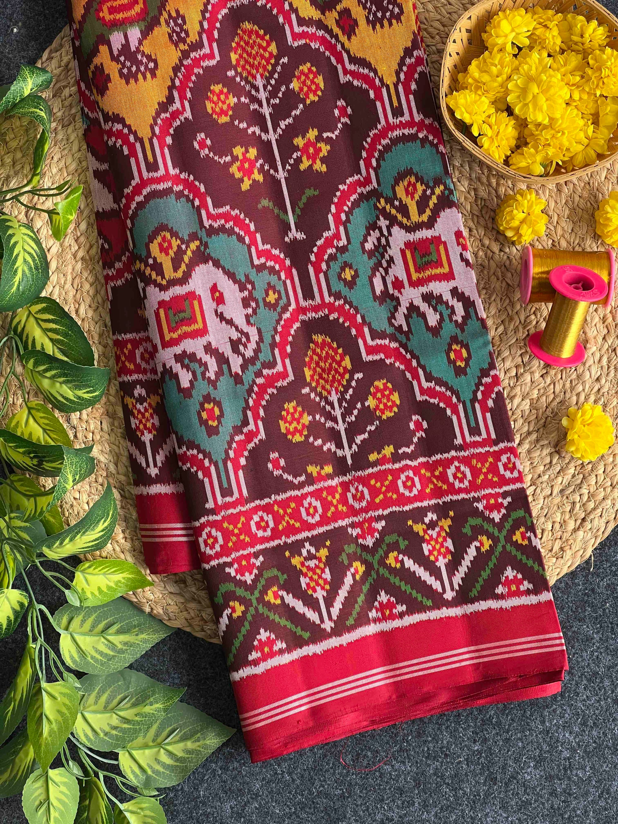 Maroon And Red Motifs Design Hand Woven Rajkot Ikat Patola Silk Saree