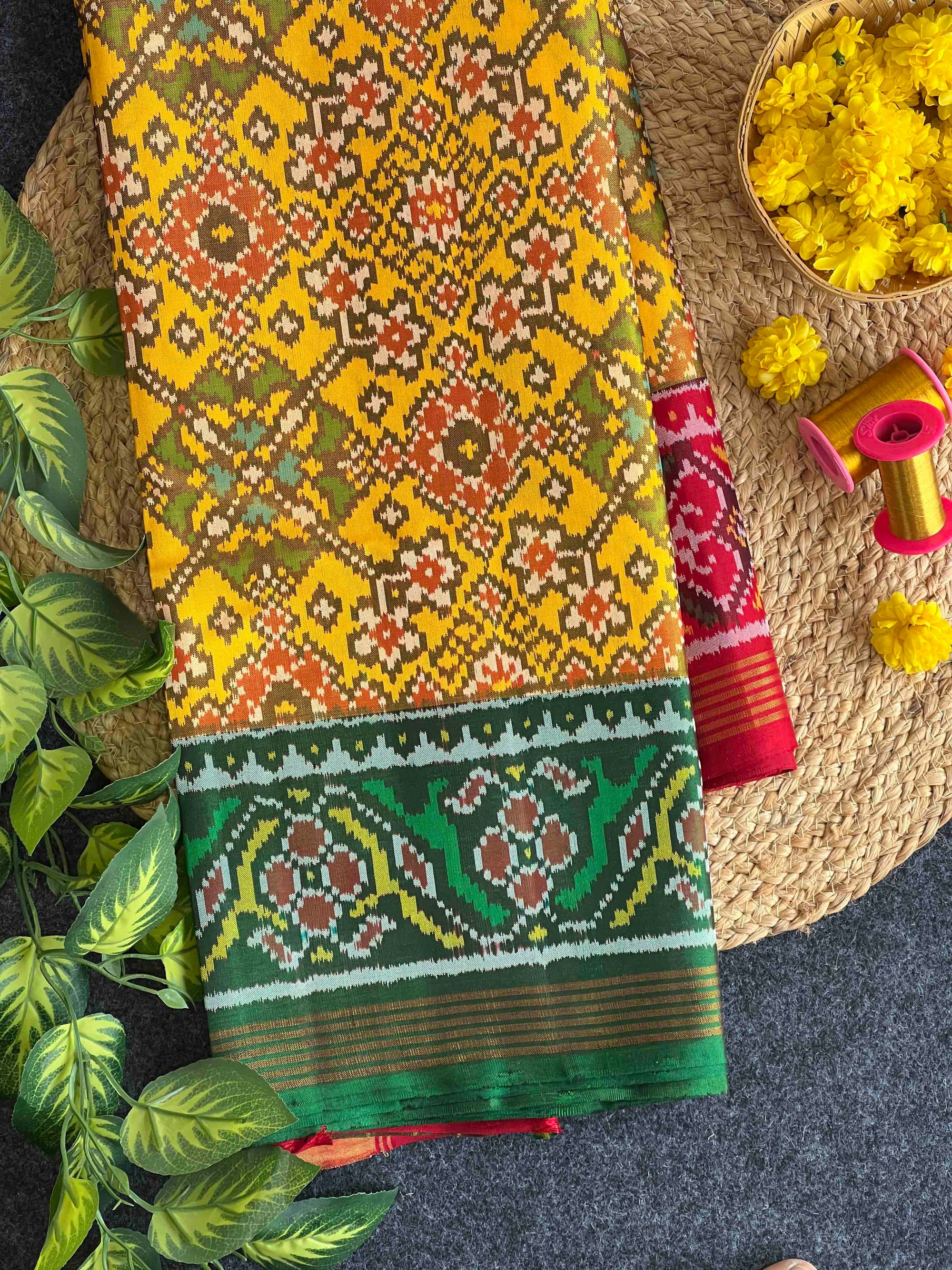 Yellow Ganga Jamuna Hand Woven Rajkot Ikat Patola Silk Saree