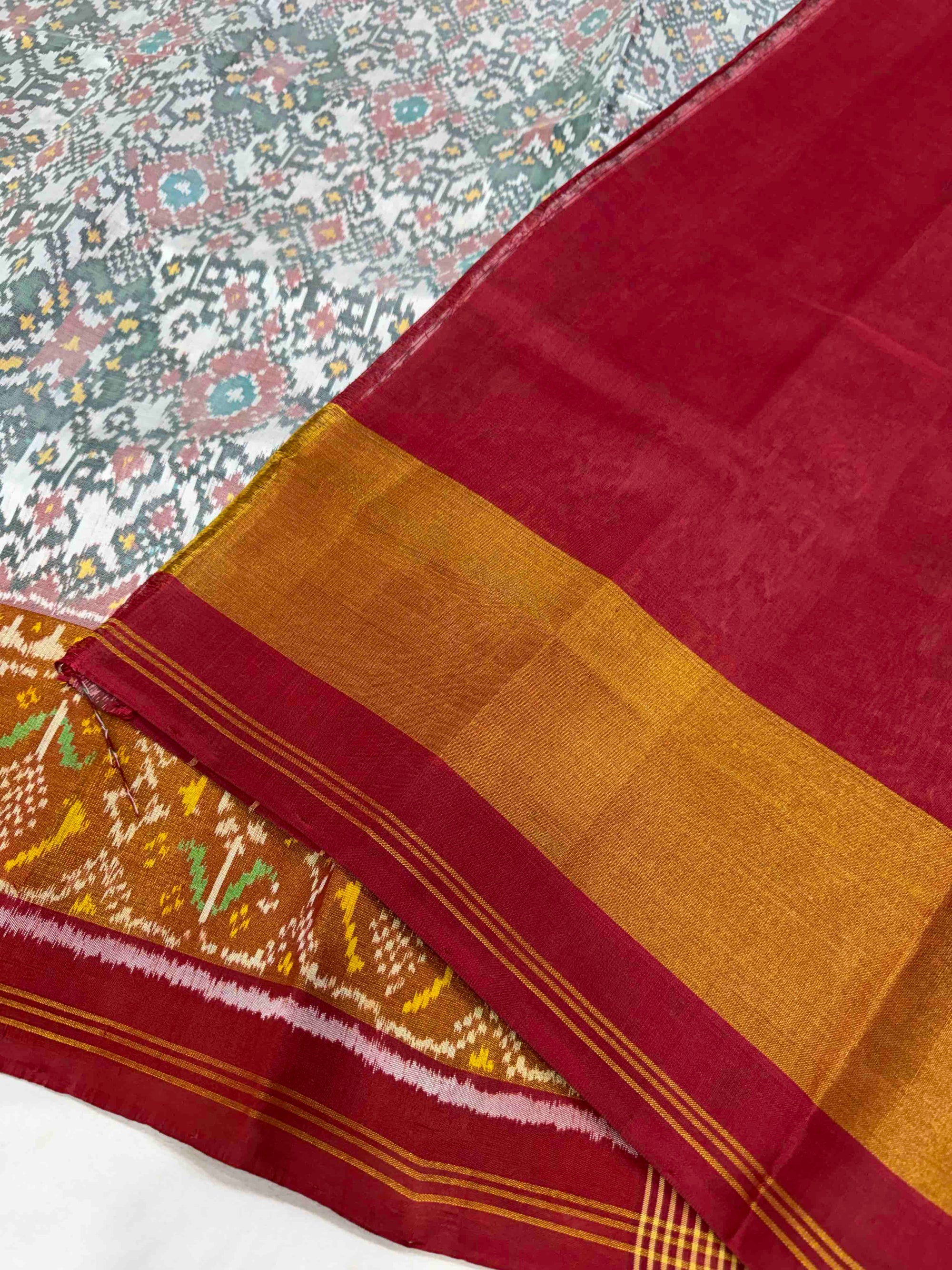 White And Red Navratan Hand Woven Rajkot Patola Silk Saree