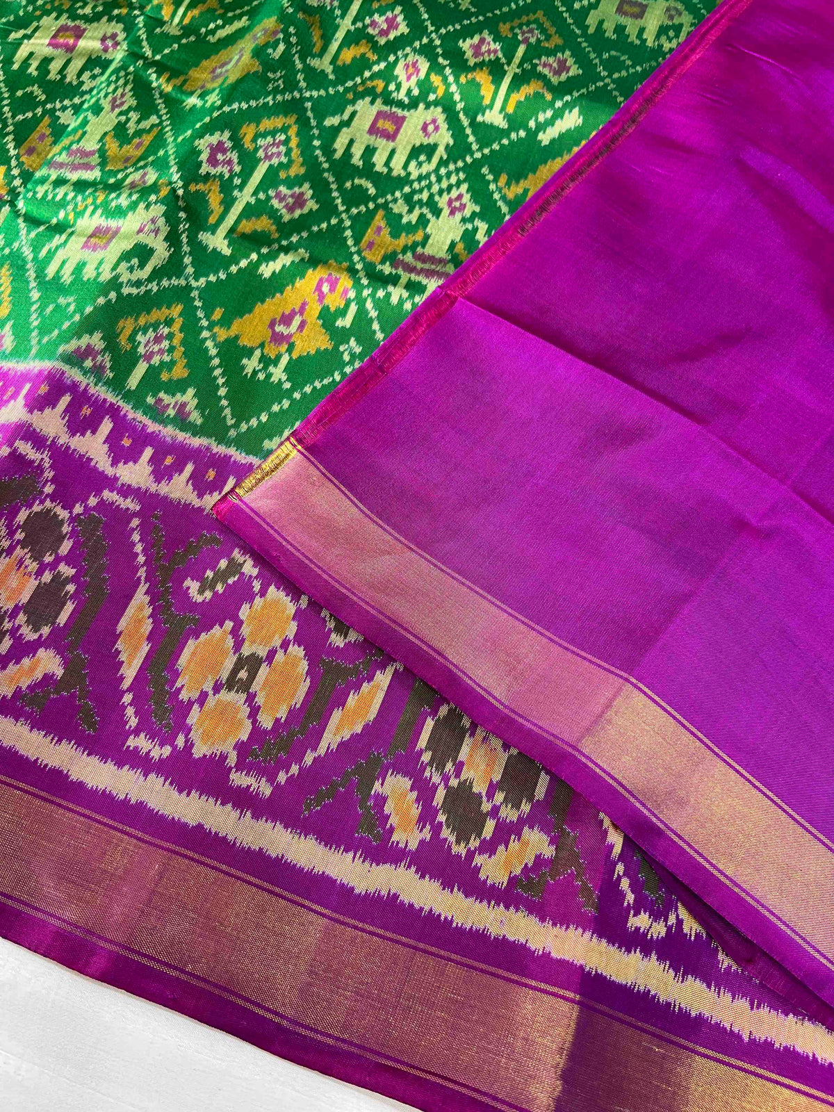 Green With Purple Narikunj Design Hand Woven Rajkot Patola Silk Saree