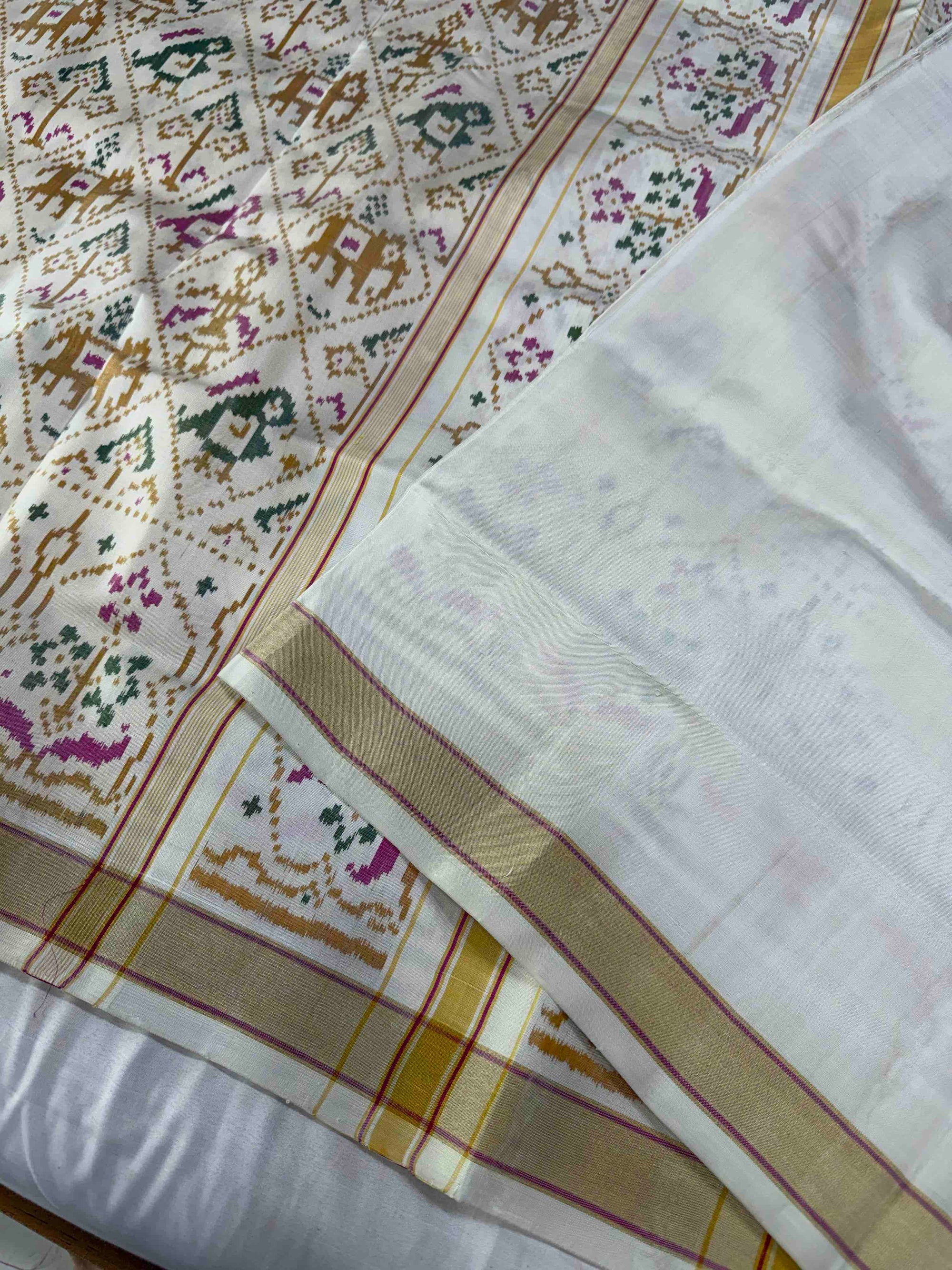 Full White Narikunj Hand Woven Rajkot Patola Silk Saree