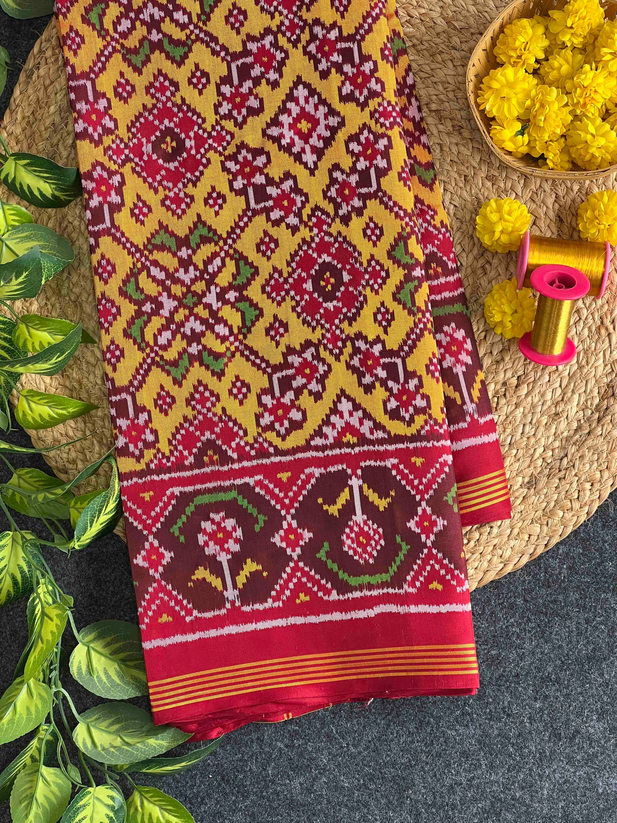 Musturd Yellow Navratan Hand Woven Rajkot Ikat Patola Silk Saree