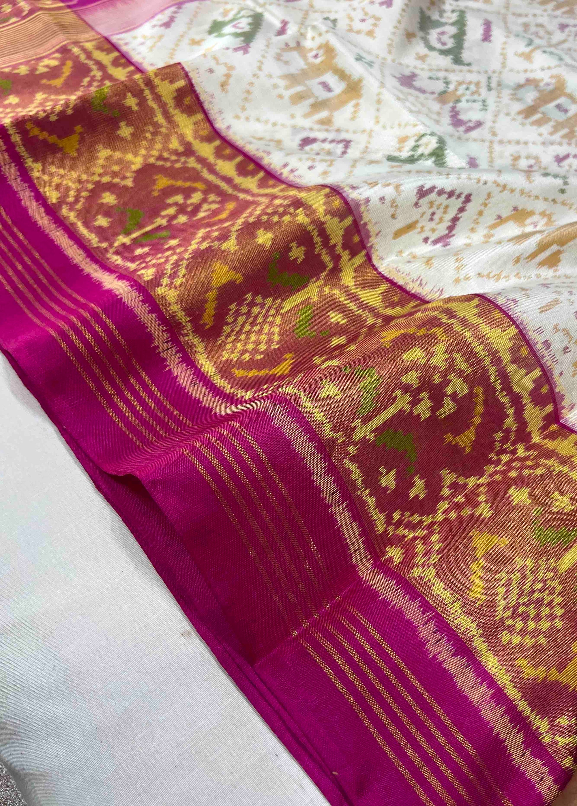 White Narikunj with Pink Pallu Traditional Design Handwoven Patola Silk Saree