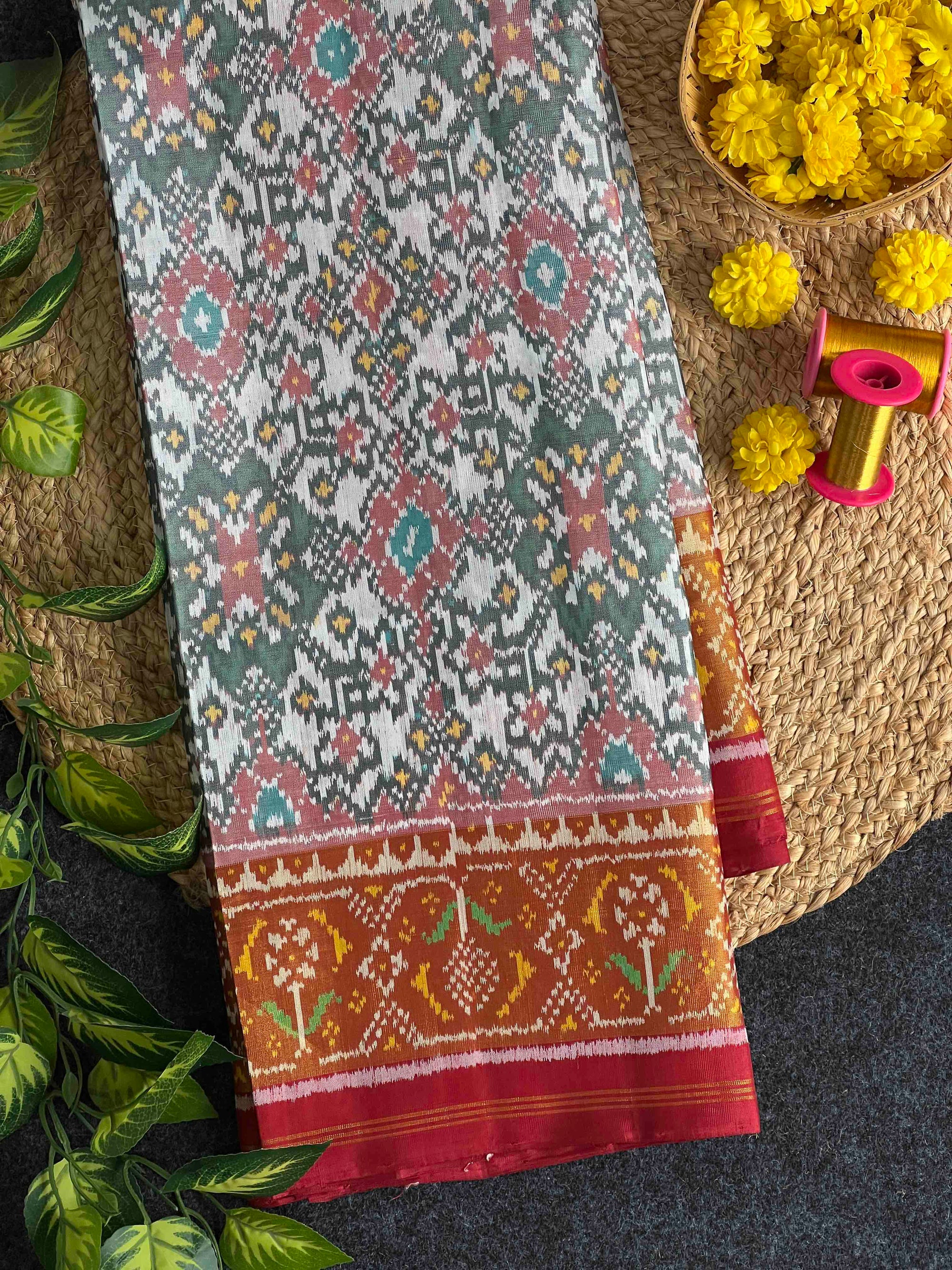 White And Red Navratan Hand Woven Rajkot Patola Silk Saree