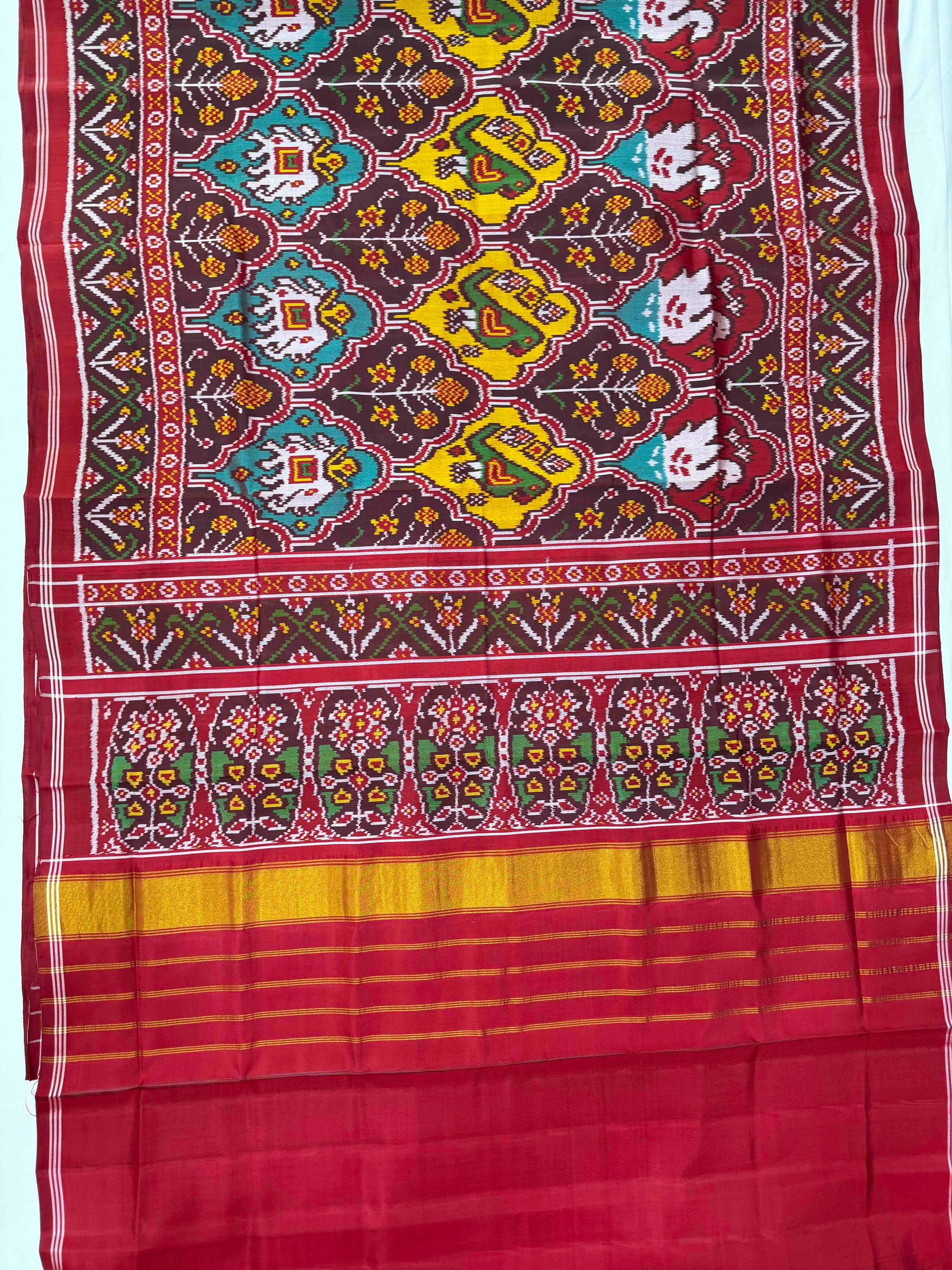 Maroon And Red Motifs Design Hand Woven Rajkot Ikat Patola Silk Saree