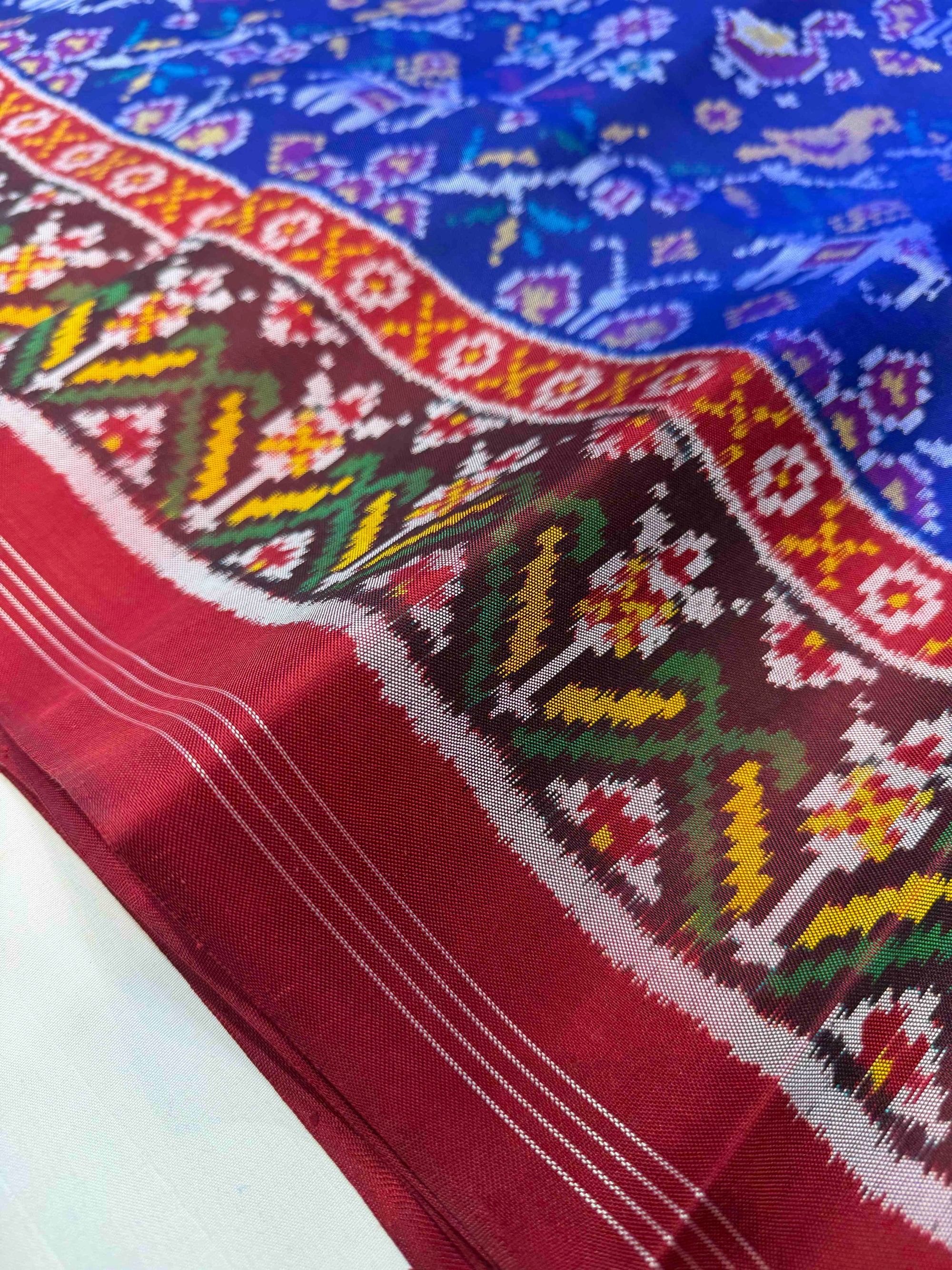 Blue And Red Fancy Small Motifs Design Hand Woven Ikat Patola Silk Saree